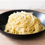 Recipe for the perfect spaghetti cacio e pepe with pecorino and parmesan cheese